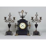 A Late 19th Century French Black and Green Variegated Marble Clock Garniture, the clock with 3.75ins