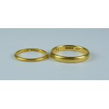 An 18ct Gold Wedding Band, size S, weight 3.9g and another 22ct, size K+, weight 1.8g