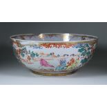 A Chinese Export Porcelain Punch Bowl, enamelled in colours with figures in landscapes, within