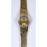 A Lady's Bueche Girod Manual Wind Wristwatch, 9ct gold with diamond set bezel, 24mm diameter case,