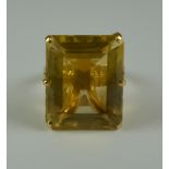 A Large Citrine Ring, Modern, 18ct gold set with a large faceted citrine stone, size O, gross weight