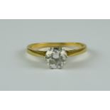 A Diamond Solitaire Ring, Modern, 18ct gold set with a brilliant cut round diamond, approximately