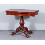 A Mahogany Veneered Card Table, of serpentine outline, baize lined folding top with square edge,