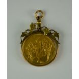 A Young Victoria 1872 Sovereign, mounted in glazed yellow metal mount, gross weight 13.7g