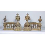 A Pair of Continental Cast Brass Chenet, modelled as balustrades with lion masks, and urn and swag