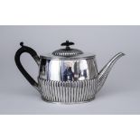 A Victorian Silver Oval Teapot, by F.B. Thomas & Co, London 1883, the domed cover with ebonised