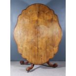 A Victorian Rosewood Oval Breakfast Table, of shaped outline with moulded crossgrain mouldings to