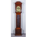 An 18th Century Oak Longcase Clock by Hindley of York, with 12ins arched brass dial with wide