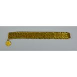 A 22ct Gold Eastern Coin Bracelet, 185mm x 20mm, gross weight 56.9g