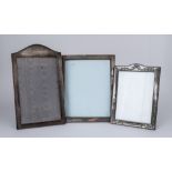 Three George V Silver Rectangular Photograph Frames, one with arched top, By Mappin & Webb,