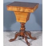 A Victorian Figured Walnut Octagonal Work Table, the top enclosing fitted interior, with tapered