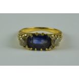 A Sapphire and Diamond Three Stone Ring, 20th Century, 18ct gold set with a centre oblong
