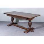 An Oak Refectory Table of "17th Century" Design, with single plank top, on turned and carved bulbous