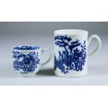 A Worcester Mug, Circa 1760-1770, printed in blue with the "Plantation Print" pattern, crescent