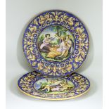 A Pair of Italian Maiolica Pottery Chargers, Late 19th Century, the centres enamelled in colours