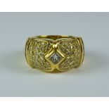 A Pavé Set Diamond Ring, Modern, yellow metal set with a central empress cut diamond,