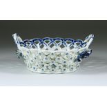 A Worcester Oval Two-Handled Basket, Circa 1770-1785, printed in blue with the "Pine Cone"