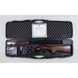 A Current Model 20 Bore Over and Under Shotgun, by Lincoln, Serial No. 300144, the 30ins blued steel