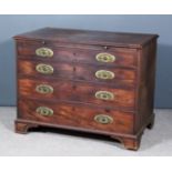 A George III Mahogany Chest, with moulded edge to top, fitted with a brushing slide and four long