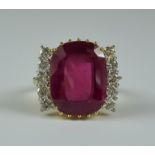 A Ruby and Diamond Ring, Modern, 18ct gold set with a centre ruby stone, approximately 5ct,
