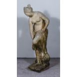 A Weathered Marble Statue of a Nude Classical Maiden Bathing, on rectangular base, 34ins high