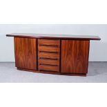 A 1950's Rosewood Bow Fronted Sideboard, fitted five central drawers flanked by cupboards, 78ins