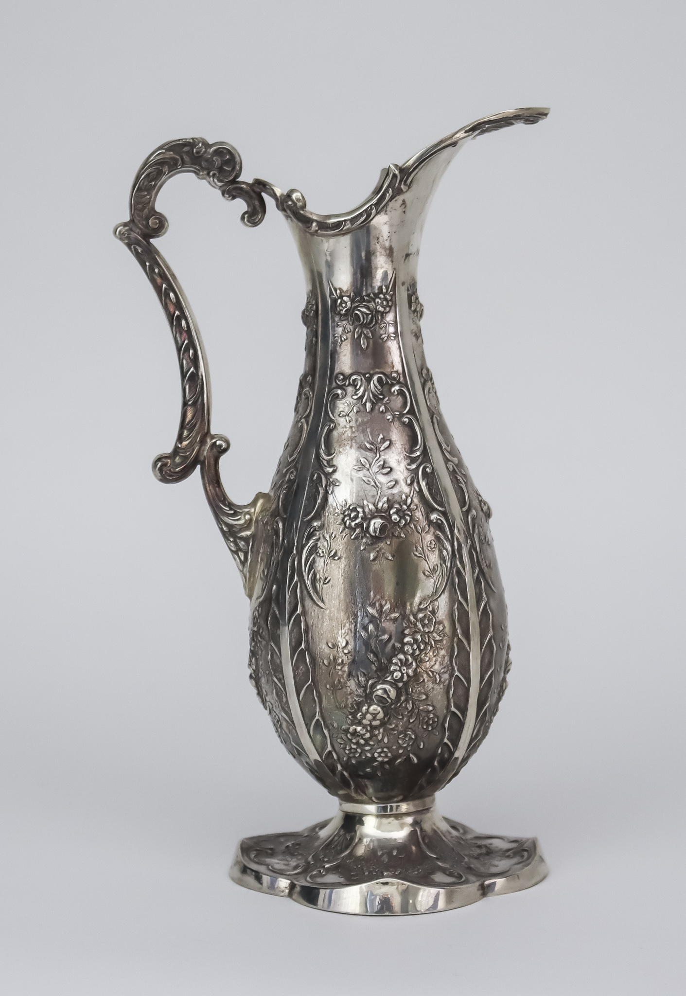 A 20th Century Spanish Silver Ewer, the slender baluster body with foliate applied rim and handle,