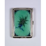 A 20th Century Alpacca White Coloured Metal and Enamel Rectangular Cigarette Case, the lid decorated