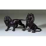 Two Japanese Bronze Figures of Lions, 20th Century, one standing, 5.25ins high (14.6cm), the other