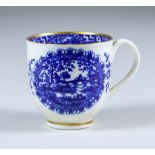 A Worcester Cup, Circa 1780-1790, printed in blue with the "Circled Landscape" pattern, disguised