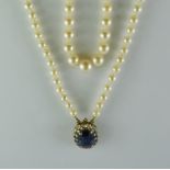 A Cultured Pearl Necklace, 20th Century, comprising two strands of graduated pearls with 9ct paste