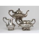 A Victorian Silver Circular Three Piece Tea Service, by William Hunter, London 1845, of compressed