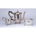 An Elizabeth II Irish Silver Cylindrical Three Piece Tea Service, by Royal Irish Silver Co.,