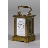 An Early 20th Century French Lacquered Brass Miniature Carriage Timepiece, retailed by Tanner of
