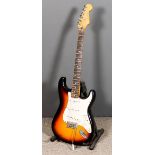 A Fender Stratocaster Electric Guitar, Serial No. MZ0011320, and black canvas bag for same