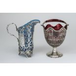 A Victorian Silver Milk Jug and a George V Silver Sugar Basket, the milk jug by Cartwright, Hirons &