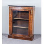 A Victorian Walnut and Gilt Metal Mounted Dwarf Display Cabinet, with ebonised edge to top, fitted