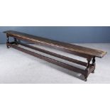 A 19th Century Oak Bench, with moulded edge to top, on baluster turned legs and with turned feet and