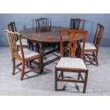 A 17th Century Oak Oval Gateleg Table, on baluster turned supports with turned feet, 56ins x 64ins x