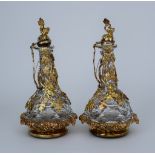 A Pair of Late 20th Century Gilt Metal Mounted and Cut Glass Decanters and Matching Coasters, of