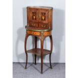 A French Kingwood and Gilt Metal Mounted Cabinet/Table, the upper part with galleried top, fitted