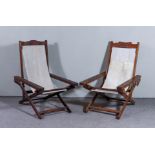 An Oak and Stained Wood Folding Deck Chair, and a similar beechwood deck chair with scroll carved