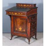 An Edwardian Inlaid Rosewood Davenport, with stationery superstructure, leather lined slope,