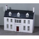 A White Painted Double Fronted Doll's House, comprising - nine rooms (including attics), 39ins