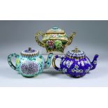 Three Gilt Metal and Enamel Teapots and Covers, after Chinese Originals, Modern, all 3.75ins high