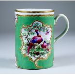 A Worcester Tankard, Circa 1770, enamelled in colours with exotic birds within shaped gilt