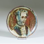 ***Eric James Mellon (1925-2014) - Elm ash glazed stoneware circular dish decorated with a