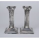 A Pair of Edward VII Silver Pillar Candlesticks, by William Hutton & Sons Ltd, London 1906, with