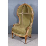 An Early 20th Century French Beechwood Framed "Porters" Armchair, the whole with moulded showwood