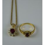 A Ruby and Diamond Suite, Modern, comprising, 18ct gold ring set with a centre ruby approximately .